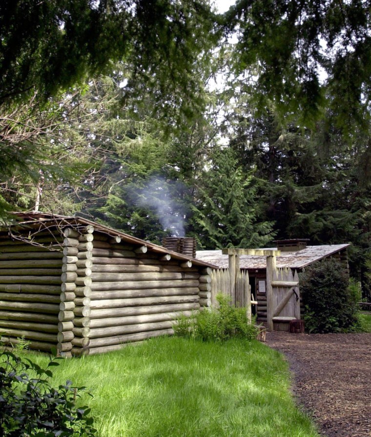 ** FILE **  Fort Clatsop, a replica of where the Lewis and Clark expedition spent the winter of 1805-1806 after reaching the Pacific, is shown near Astoria, Ore., in this April 29, 2003 file photo.  Fort Clatsop was destroyed by fire, park superintendent Chip Jenkins said Tuesday, Oct. 4, 2005. Volunteer firefighters worked for hours Monday night to try to save the fort, Jenkins said, but ``half of the fort was burned up, and the other half is essentially a loss.''   (AP Photo/Don Ryan, File)