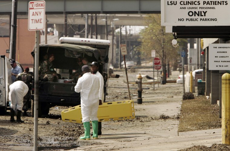 A coroners' team prepares to remove the bodies of victims of Hurricane Katrina at the Louisiana State University Medical Center