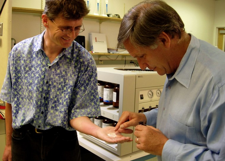 Jeremy Minshull, (President of DNA 2.0 in Menlo Park, CA) shows Robert Krulwich dust which contains Thymine, the \"T\" of A, T, G, C, one of the 4 bases that provides the building blocks of DNA.

Credit: Julia Cort