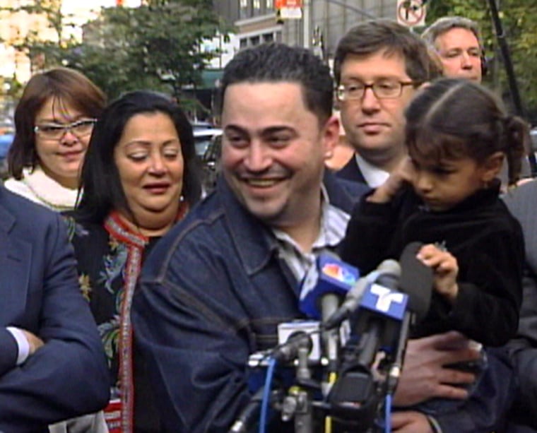 David Lemus was released from prison after 14 years in October 2005. His mother, Nilsa Huertas, behind him, was overcome by emotion after he walked out of court a free man.