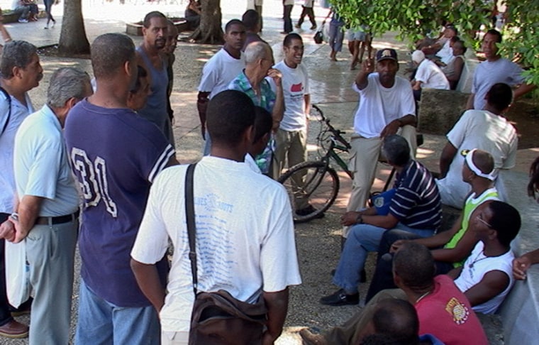 Cuban fans debate the World Series at “soapbox corner” in Havana’s Central Park.
