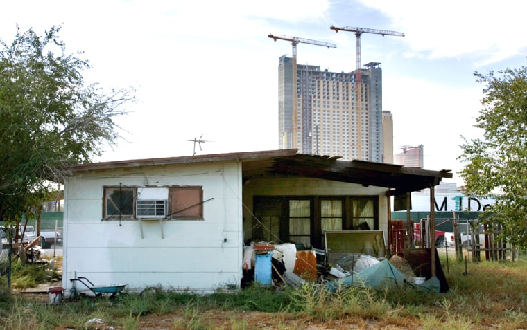 Manuel Corchuelo's 700-square-foot house in the Las Vegas neighborhood of Naked City, purchased for $30,000 in 1978, is currently on the market for $1.2 million. The tract home is rapidly being surrounded by high-rise condominium projects.