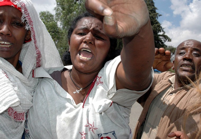 An Ethiopian woman screams in grief outside the Black Lion Hospital in Addis Ababa Ethiopia