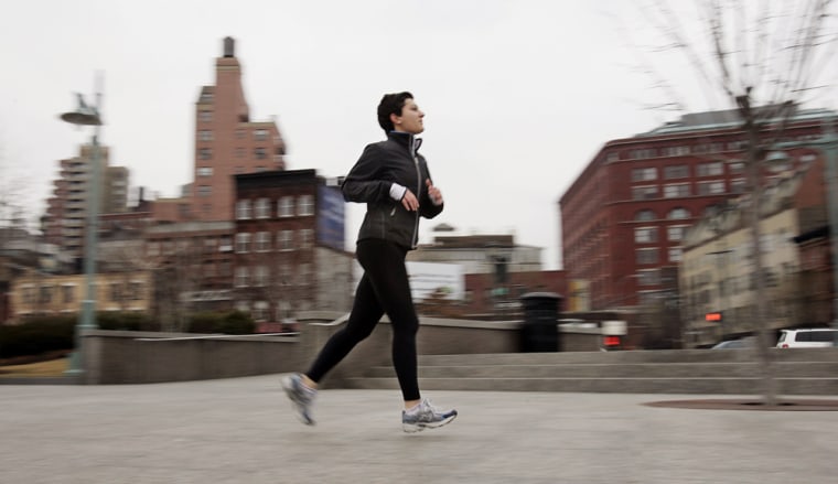 A runner trains along New York's Hudson River.