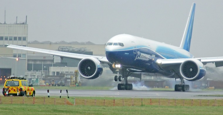 A Boeing 777-200LR touches down at the r