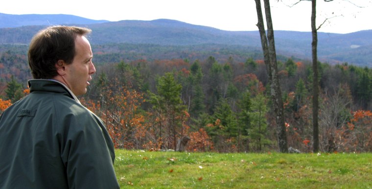 Plainfield, N.H. resident Brad Wilder stands in front of his hillside home's sweeping view -- the subject of a strange tax battle since 2003.