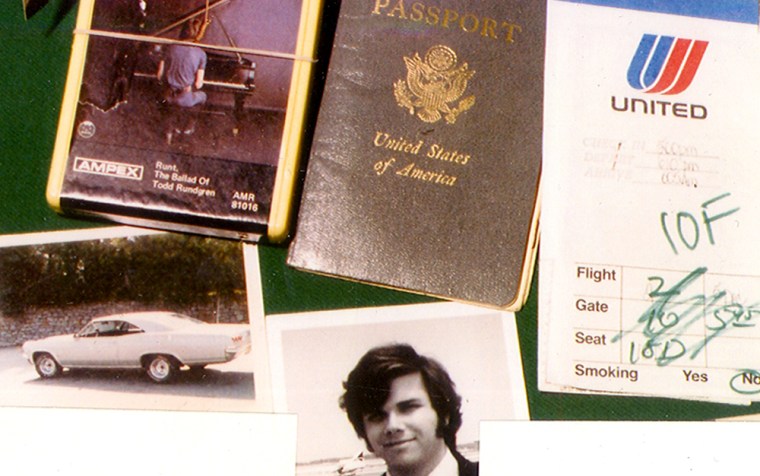 A redacted police photograph of the belongings Mark David Chapman left behind in a New York hotel room.