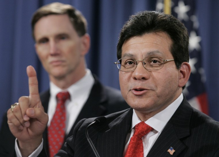 Attorney General Alberto Gonzales, with Federal Bureau of Investigation Assistant Director John Pistole, left, announces the indictment of Jose Padilla during a news conference at the Department of Justice, Tuesday, Nov. 22, 2005 in Washington. Padilla, a Brooklyn-born Muslim convert, held for three years as an enemy combatant suspected of plotting a \"dirty bomb\" attack in this country, has been indicted on charges that he conspired to \"murder, kidnap and maim\" people overseas.  (AP Photo/Manuel Balce Ceneta)