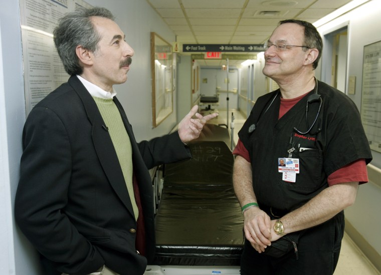 Alan Weiss, left, once a news producer at WABC-TV in New York, and Dr. Stephan Lynn, emergency room director at New York's St. Luke's-Roosevelt Hospital Center, reunite at the hospital, Nov. 30, 2005, 25 years after they were present when singer John Lennon was brought mortally wounded to the hospital. Lynn was the attending physician the night John Lennon was admitted after he was shot, and Weiss, who reported the news about Lennon to WABC, was a patient in the same emergency room Dec. 8, 1980. (AP Photo/Richard Drew)