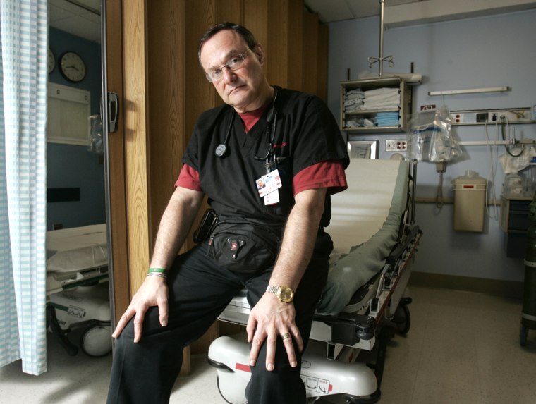 Dr. Stephan Lynn, emergency room director of St. Luke's-Roosevelt Hospital Center in New York, poses in the emergency room at the hospital, Nov. 30, 2005. Lynn was the attending physician the night John Lennon was admitted after he was shot outside the Dakota apartment building, Dec. 8, 1980. (AP Photo/Richard Drew)