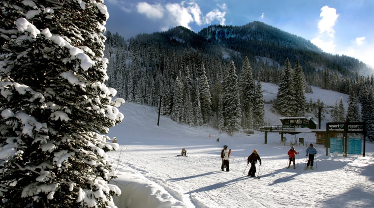 Skiers arrive at the bottom of the hill at Snowbird Ski and Summer Resort after the first substantial dose of snow Monday, Nov. 28, 2005, in Snowbird, Utah.