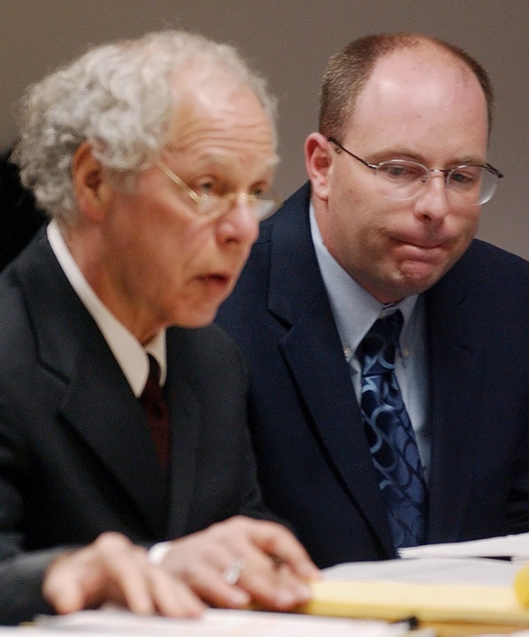 Jason Strickland, right and his attorney, Richard Rubin are seen in Westfield  District Court in Westfield, Mass. Friday, Dec. 2, 2005. Strickland  is charged with taking part in the beating that left his stepdaughter Haleigh Poutre in a coma. The state Department of Social Services, which has custody of Haleigh, is seeking to end the girl's life support. Strickland is fighting the effort and would likely face a murder charge if she dies. (AP Photo/Springfield Republican, Dave Roback)