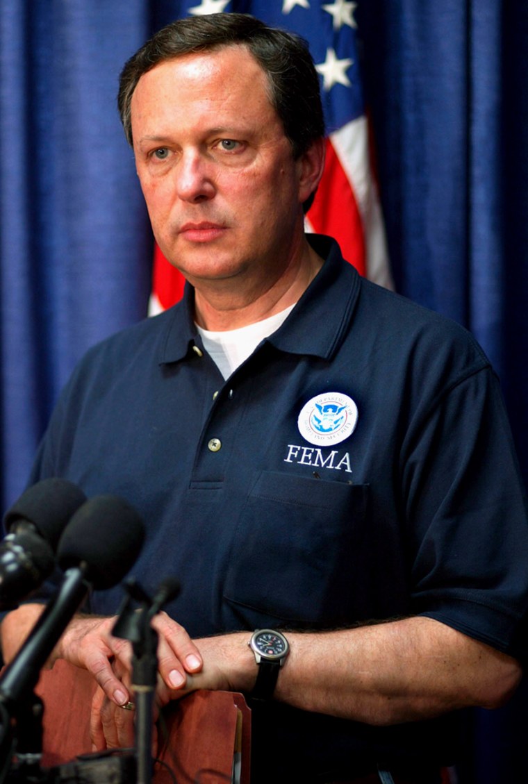 FEMA Secretary Michael Brown makes a statement at the Louisiana State Emergency Operations Center