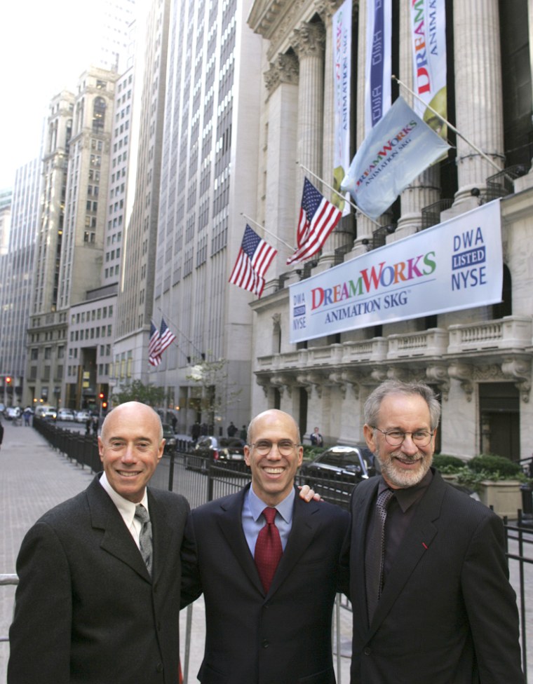 DreamWorks founders David Geffen, left, Jeffrey Katzenberg, center, and Steven Spielberg celebrate their IPO outside the New York Stock Exchange last year. Paramount Pictures has agreed to buy their film studio in a deal worth $1.6 billion.