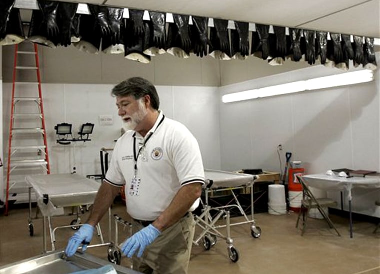Dr. Louis Cataldie, the Louisiana medical examiner, stands in the Victim Identification Center in Carville, La., on Dec. 1. Cataldie is examining the cause of violent deaths that happened during Katrina.