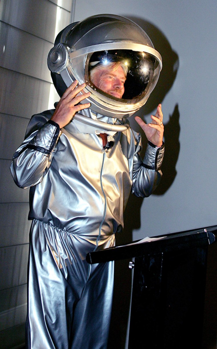 Richard Branson arrives in a space suit