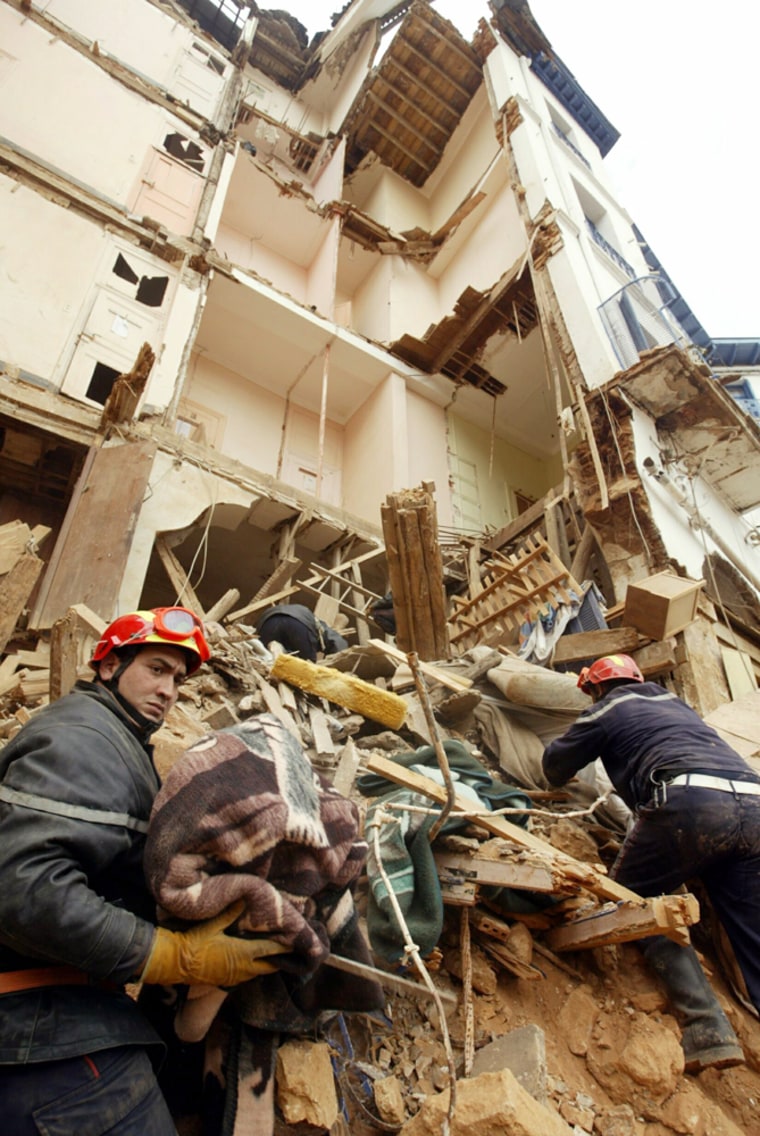 Algerian rescue workers search for survivors after four-storey hotel collapsed in old district in central Algiers