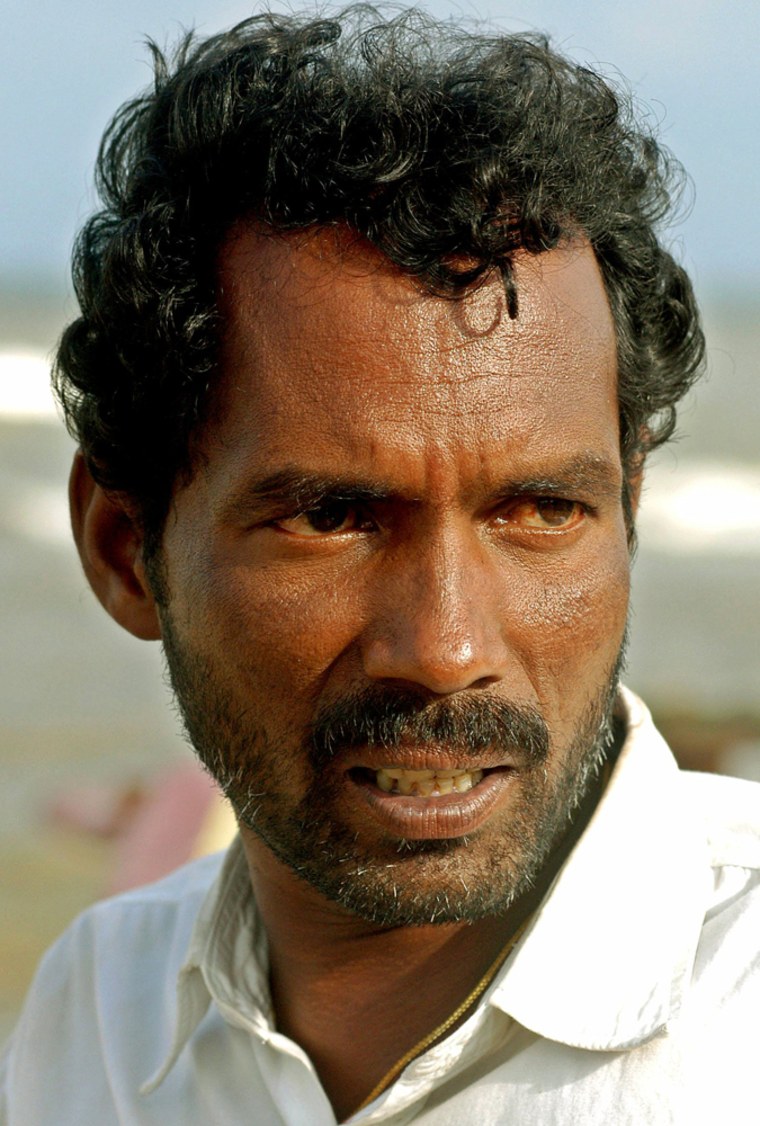 Indian fisherman looks on in the Nagapattinam district