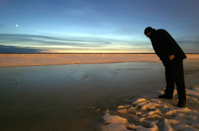 A local recident looks into the Amur riv