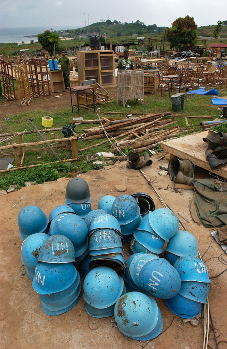 Bangladeshi troops preparing for departure dismantle their camp in the village of Goderich on the outskirts of Freetown, Sierra Leone, on Dec. 3, 2005 in this photo released by the U.N. peacekeeping mission in Liberia. 
