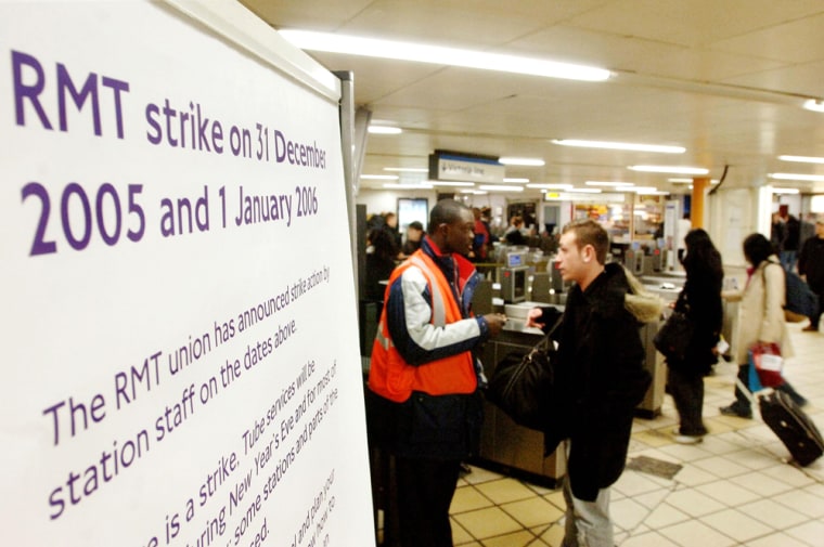 A sign at Victoria underground Station in London warns passengers of possible disruption to services Saturday. Hundreds of thousands of London's New Year's Eve revelers faced transport chaos on Saturday as underground rail station staff staged a 24-hour strike on one of the busiest nights of the year.