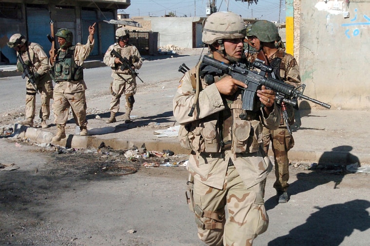 US Army and Iraqi soldiers conduct security patrol in northern Iraqi town of Tal Afar