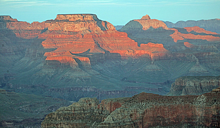 Conservation groups plan to acquire land stretching along 125 miles of the Grand Canyon's North Rim.