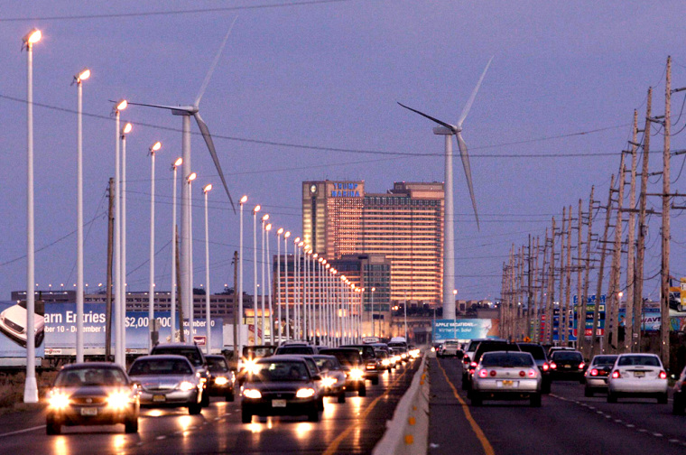 Two turbines from the Jersey-Atlantic Wind Farm are visible at the Route 30 entrance to Atlantic City, N.J. The turbines were erected at a wastewater treatment facility.