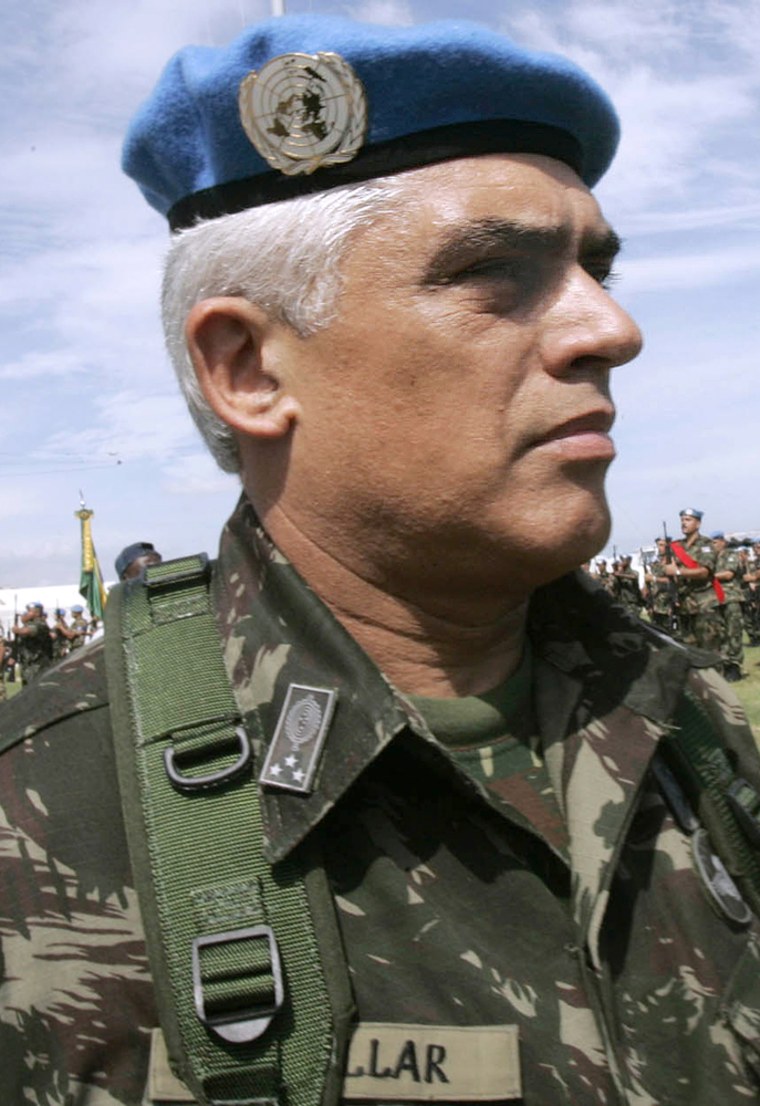 Brazilian Army Gen. Urano Teixeira da Mata Bacellar marches in front of troops during a ceremony marking power transition of the Brazilian UN Commander in Port-au-Prince, Haiti, in this Aug. 31, 2005 file photo. 