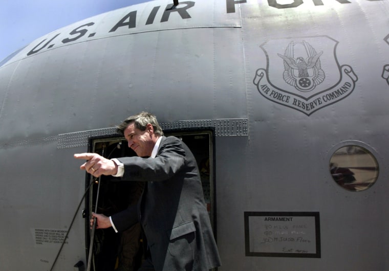 U.S. Administrator L. Paul Bremer boards an Air Force plane as he leaves Baghdad in June 2004.