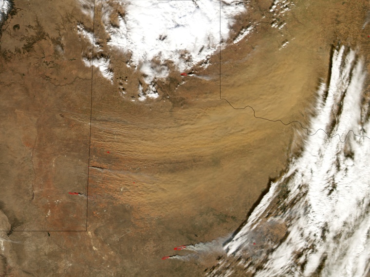 This satellite photo shows a huge dust storm blowing east from northern Texas and into Oklahoma on Jan. 1. 
