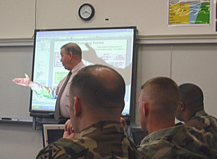 At the Command and General Staff College, in Forth Leavenworth, Kansas, Army instructor Stuart Lyon teaches a seminar on the theory of counterinsurgency.