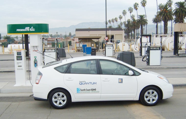 A Toyota Prius converted to run on hydrogen instead of gasoline is refueled at a special station at the South Coast Air Quality Management District in Diamond Bar, Calif.