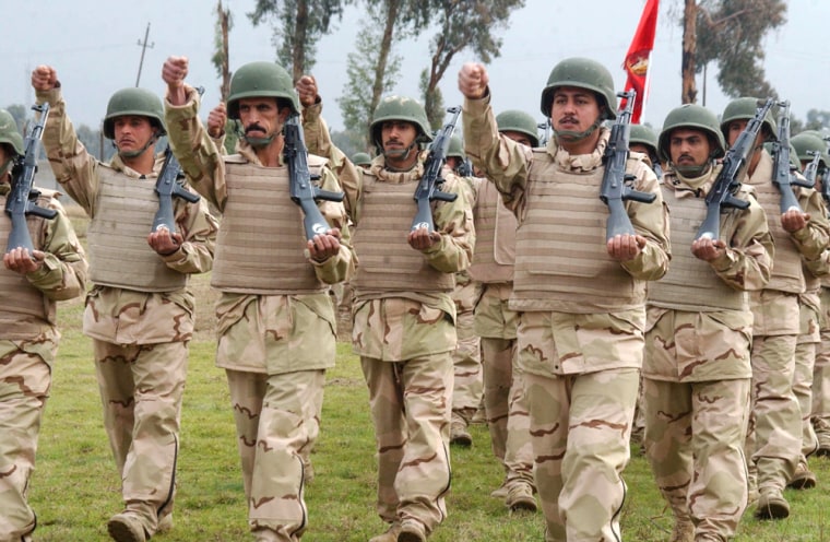 IRAQI FORCES MARCH DURING HAND-OVER CEREMONY