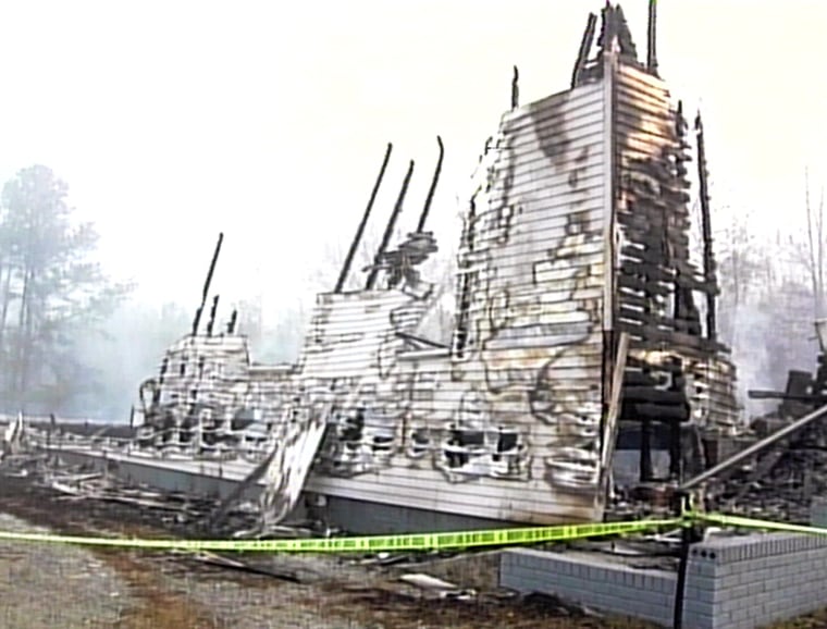 A charred wall was all that was left Friday of the Rehobeth Baptist Church in Randolph, Ala., after a fire that appears to be arson.