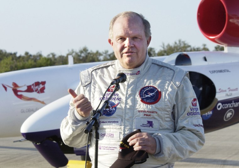 Pilot Steve Fossett takes questions from