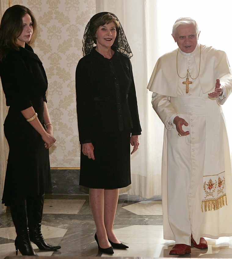Pope Benedict XVI gestures as he meets US first lady Laura Bush and her daughter Barbara at the Vatican