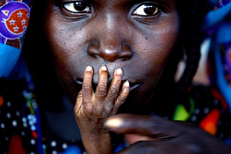 The award-winning photo showing a mother and child at an emergency feeding center in Tahoua, Niger, Aug. 1, 2004.