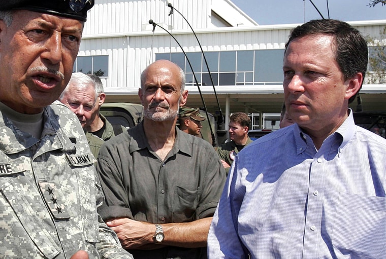 Army Lt. General Russel Honore, left; Homeland Security Director Michael Chertoff, center; and former FEMA Director Mike Brown talk with reporters in New Orleans after Hurricane Katrina made landfall in September.
