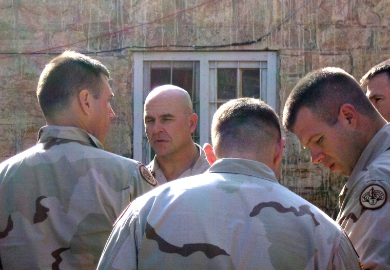 Col. H.R. McMaster, commander of the Army's 3rd Armored Cavalry Regiment, facing camera, confers with Lt. Col. Chris Hickey, far left, and other officers before a meeting with Iraqi leaders in the Ottoman castle in downtown Tall Afar.
