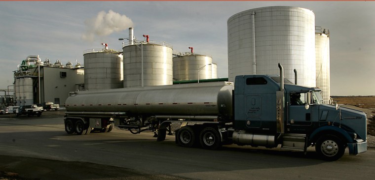 A tanker truck carrying 7,700 gallons of ethanol leaves a production plant in Garnett. California officials say President Bush's push for more ethanol could raise carbon levels given that the fuel is trucked to distribution stations in the West and East.