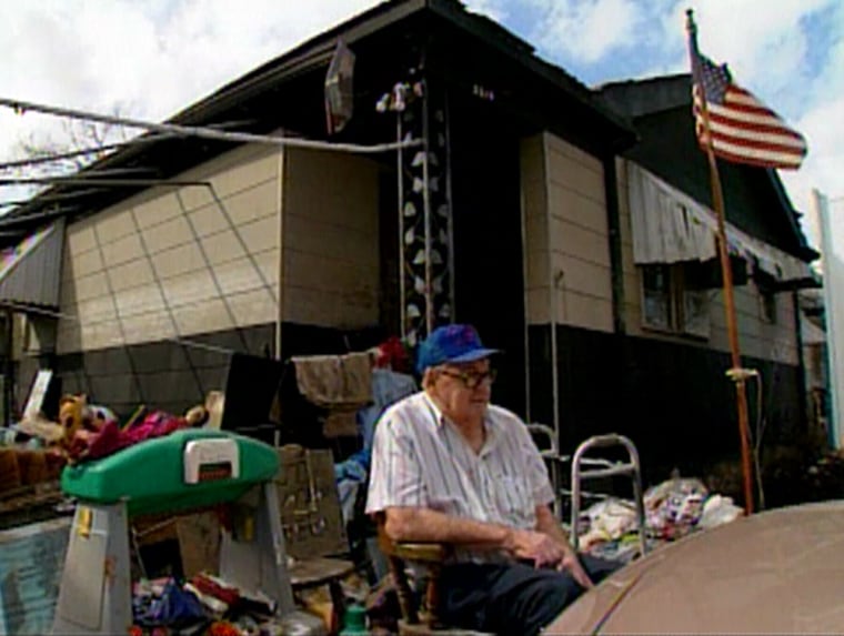 Lawrence Kampa, 82, outside his uninhabitable New Orleans home.