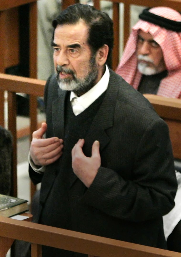 Former Iraqi President Saddam Hussein speaks at his trial in Baghdad on Wednesday.