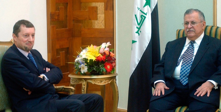 Iraqi president Jalal Talabani, right, talks with French Ambassador in Iraq Bernard Bajule during meeting in Baghdad, Iraq, on Sunday.