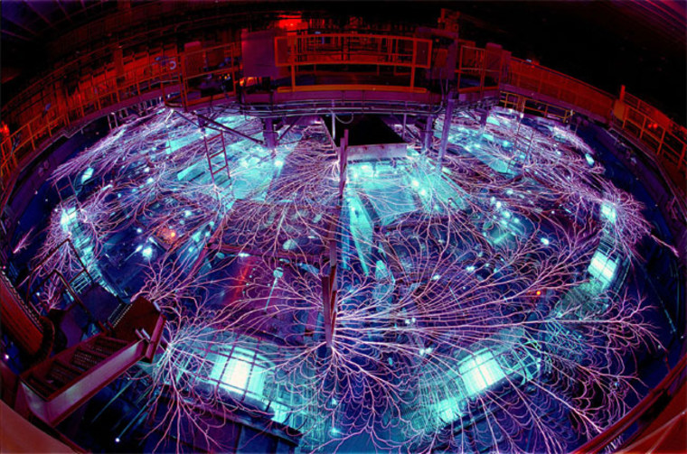 Because of the high voltage involved, the Z machine is submerged in oil and water. This image shows lightning arcs beneath the liquid surface.