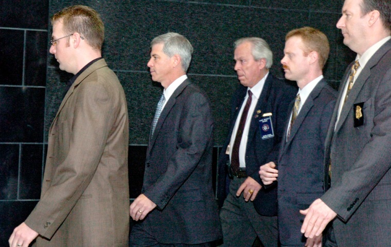 Andrew Fastow, former CFO of Enron, is escorted by Federal Marshalls into the Federal Court in Houston