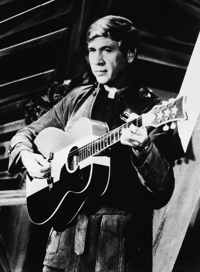 Buck Owens Perfroms On Stage