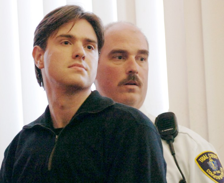 Entwistle of Britain is seen with court officer in Framingham District Court during arraignment in Framingham