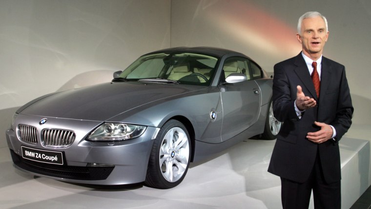 Chief Executive of German luxury carmaker BMW Panke poses after the company's annual news conference in Munich
