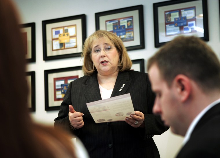 Dr. Linda Eagle is president of a consulting firm based that trains bankers on regulatory issues. Eagle is pictured conducting a training session with her staff on elder financial abuse at her offices in Fort Washington, Pa., last week.